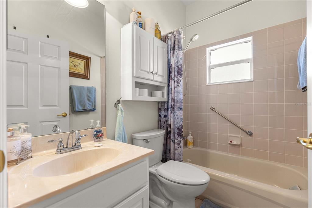 9250 Southwest 96th Court Road Ocala, FL 34481 - Photo 31 of 46 a bathroom with a sink toilet and shower