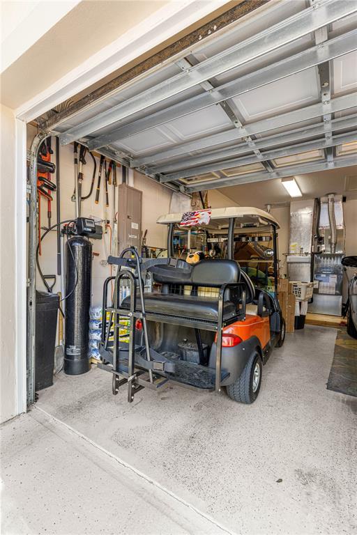 9250 Southwest 96th Court Road Ocala, FL 34481 - Photo 46 of 46 a view of parking garage with cars