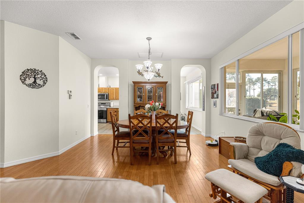 9250 Southwest 96th Court Road Ocala, FL 34481 - Photo 9 of 46 a view of a dining room with furniture window and outside view