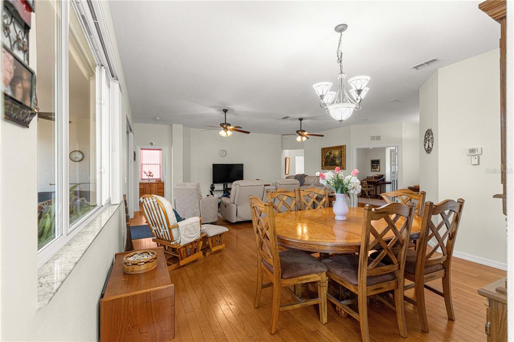9250 Southwest 96th Court Road Ocala, FL 34481 - Photo 10 of 46 a view of a dining room with furniture window and outside view