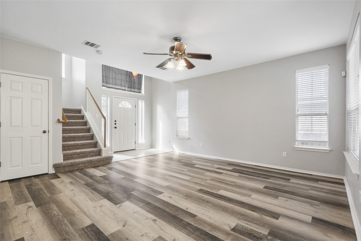 9405 Billingham Trail Austin, TX 78717 - Photo 11 of 40 wooden floor in an empty room with a window
