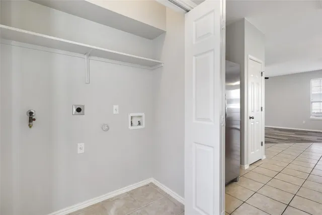 a view of a hallway with closet