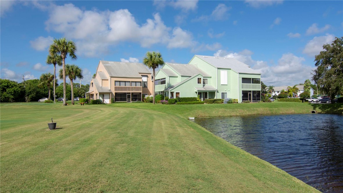 9632 Riverside Drive, Unit 2 Sebastian, FL 32958 - Photo 19 of 29 a view of a house with a big yard