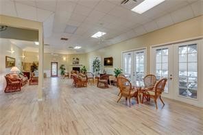9632 Riverside Drive, Unit 2 Sebastian, FL 32958 - Photo 26 of 29 a living room with furniture and wooden floor