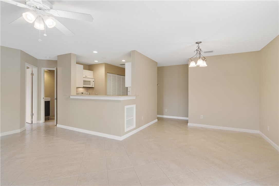 9632 Riverside Drive, Unit 2 Sebastian, FL 32958 - Photo 6 of 29 a view of a kitchen with a sink and cabinet area