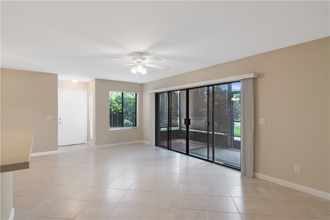 9632 Riverside Drive, Unit 2 Sebastian, FL 32958 - Photo 8 of 29 a view of an empty room with glass door