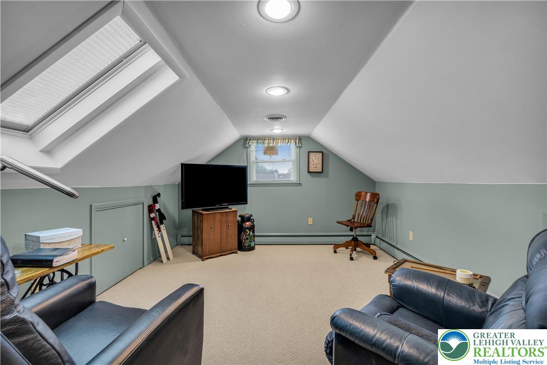 2750 Belaire Road Bethlehem, PA 18017 - Photo 38 of 56 Angled ceilings and overhead skylights define this cozy attic space featuring soft carpeted flooring.