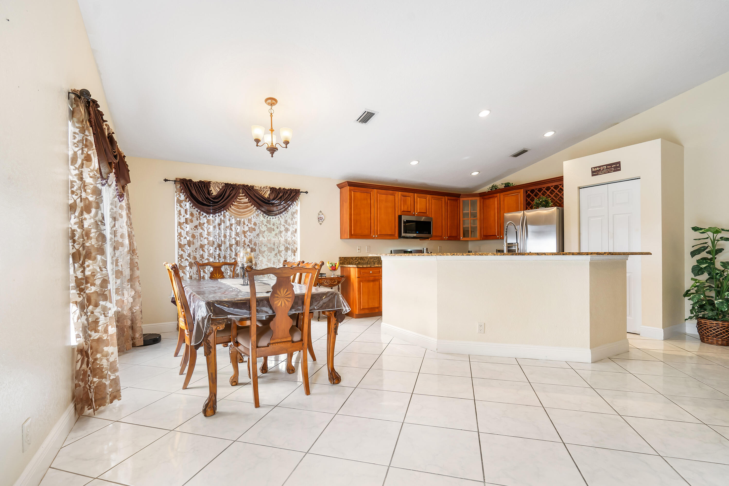 236 Malibu Circle Greenacres, FL 33413 - Photo 12 of 51 Kitchen & Dining Area