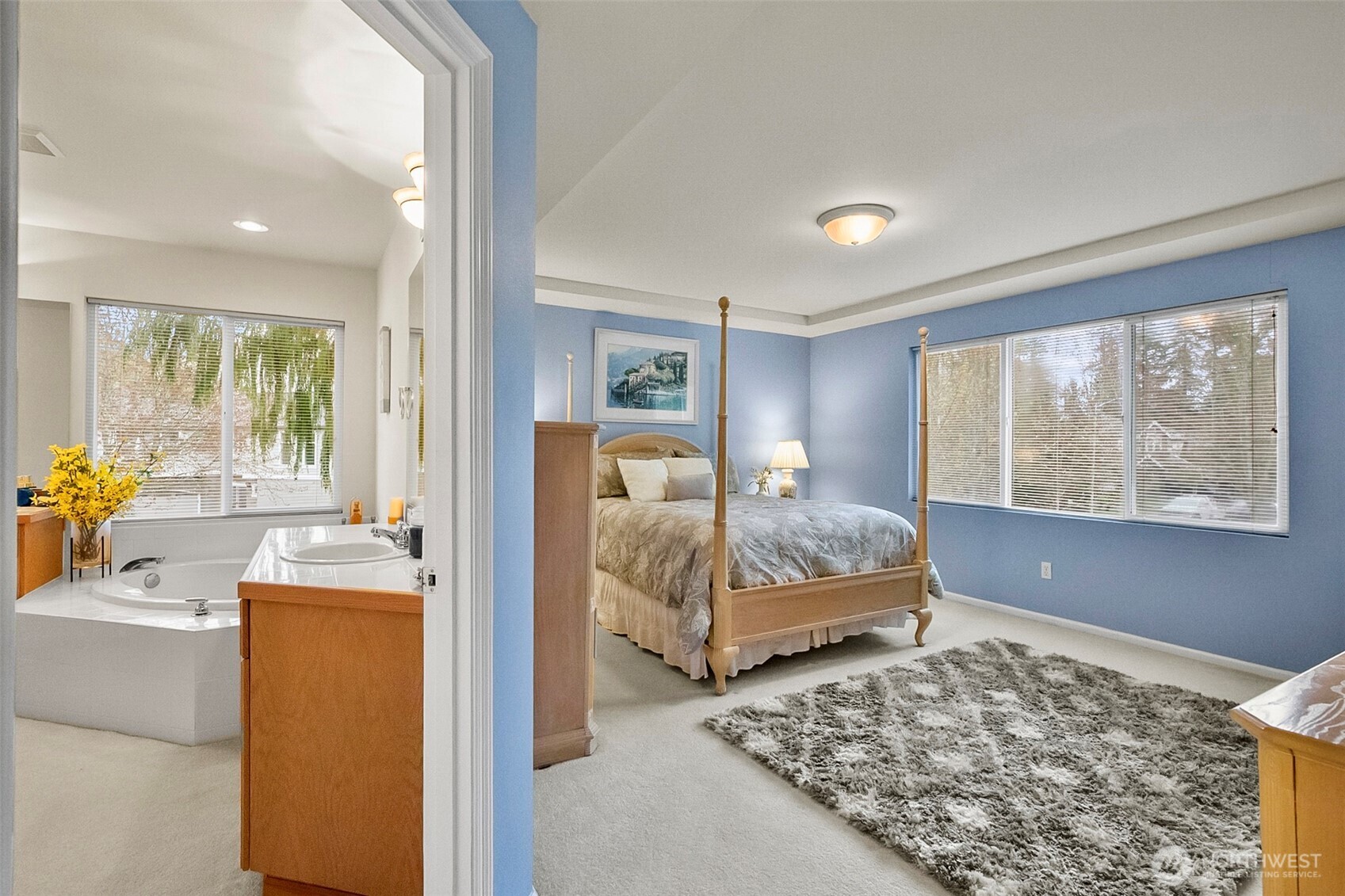 17401 33rd Drive Southeast Bothell, WA 98012 - Photo 24 of 39 a bedroom with a bed and wooden floor