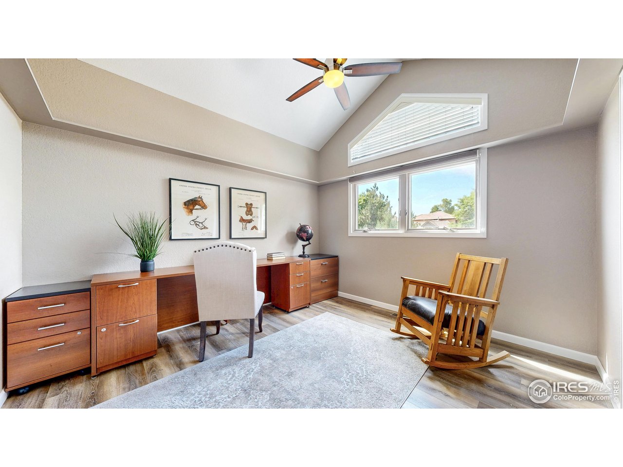 898 Eagle Ridge Court Loveland, CO 80537 - Photo 25 of 40 a living room with furniture and a window