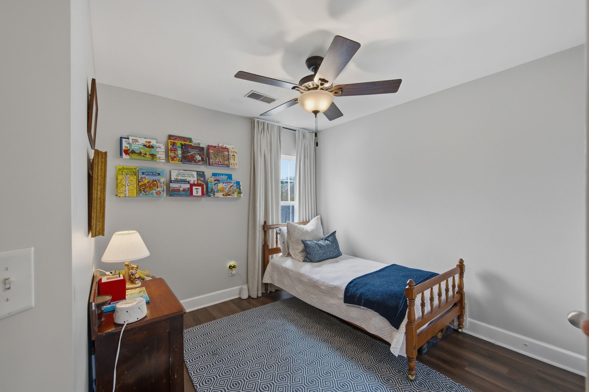 1505 Tolkien Lane Nashville, TN 37211 - Photo 23 of 27 a bedroom with a bed and a chandelier