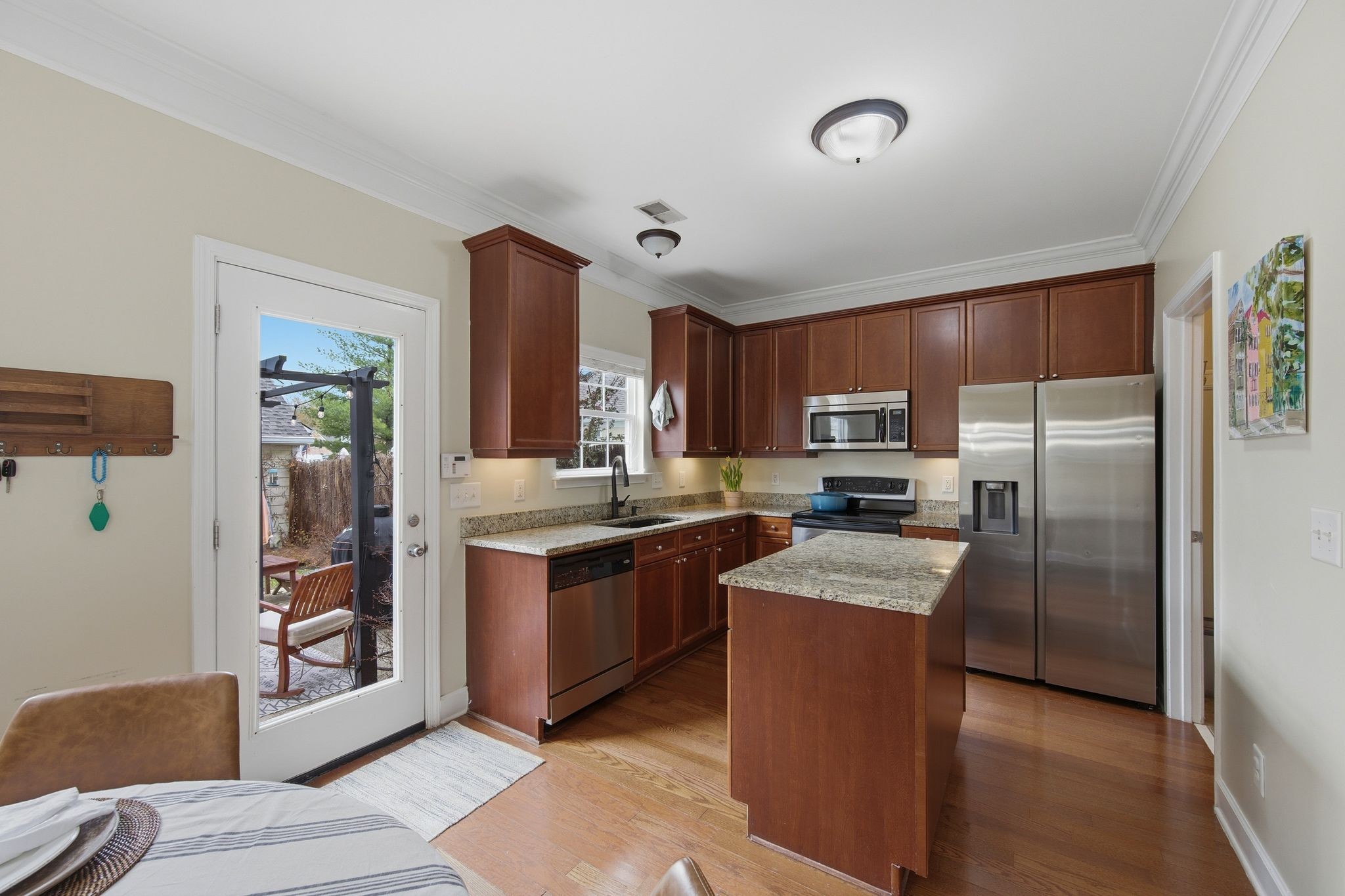 1505 Tolkien Lane Nashville, TN 37211 - Photo 9 of 27 a kitchen with stainless steel appliances granite countertop a refrigerator oven a sink and dishwasher