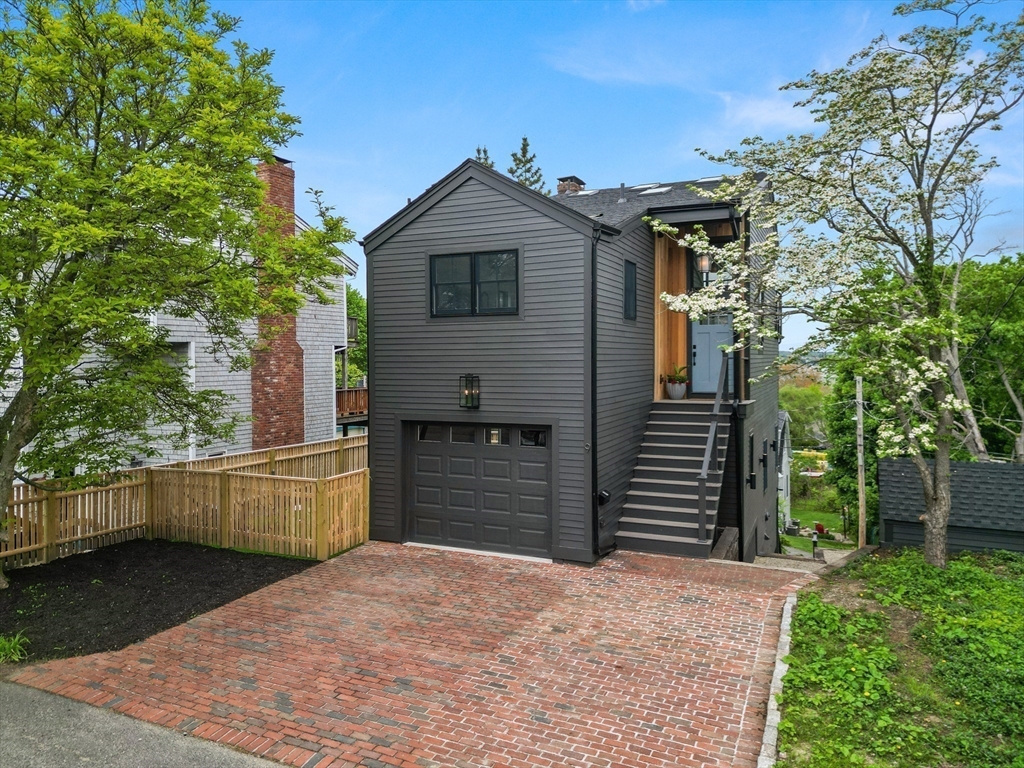 9 Upland Road Marblehead, MA 01945 - Photo 1 of 42 a front view of a house with a yard