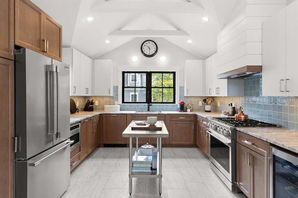 9 Upland Road Marblehead, MA 01945 - Photo 6 of 42 a kitchen with a refrigerator and a stove