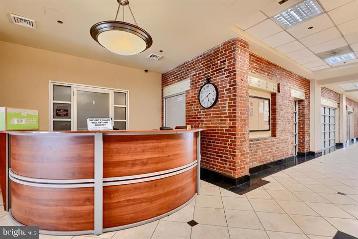 2702 Lighthouse Point East, Unit 631 Baltimore, MD 21224 - Photo 30 of 41 Front desk