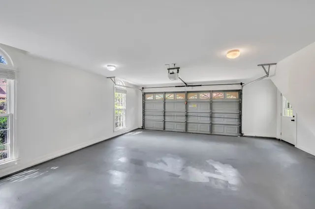 a view of an empty room with windows
