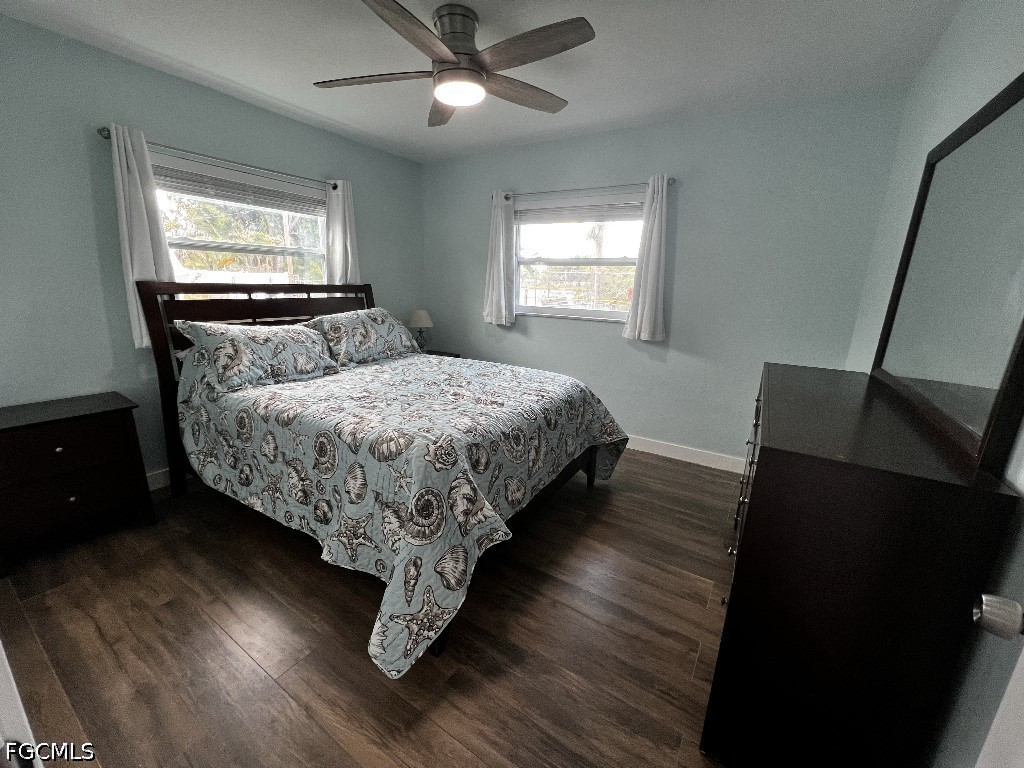 144 Whidden Road North Fort Myers, FL 33917 - Photo 9 of 16 a bedroom with a bed and window
