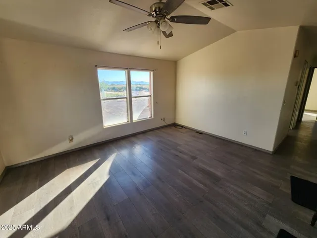 a kitchen with stainless steel appliances a stove a refrigerator and a stove