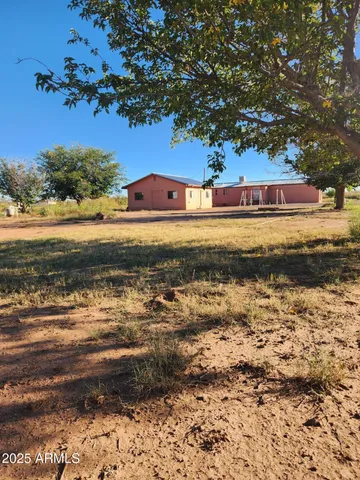 a view of a house with a street