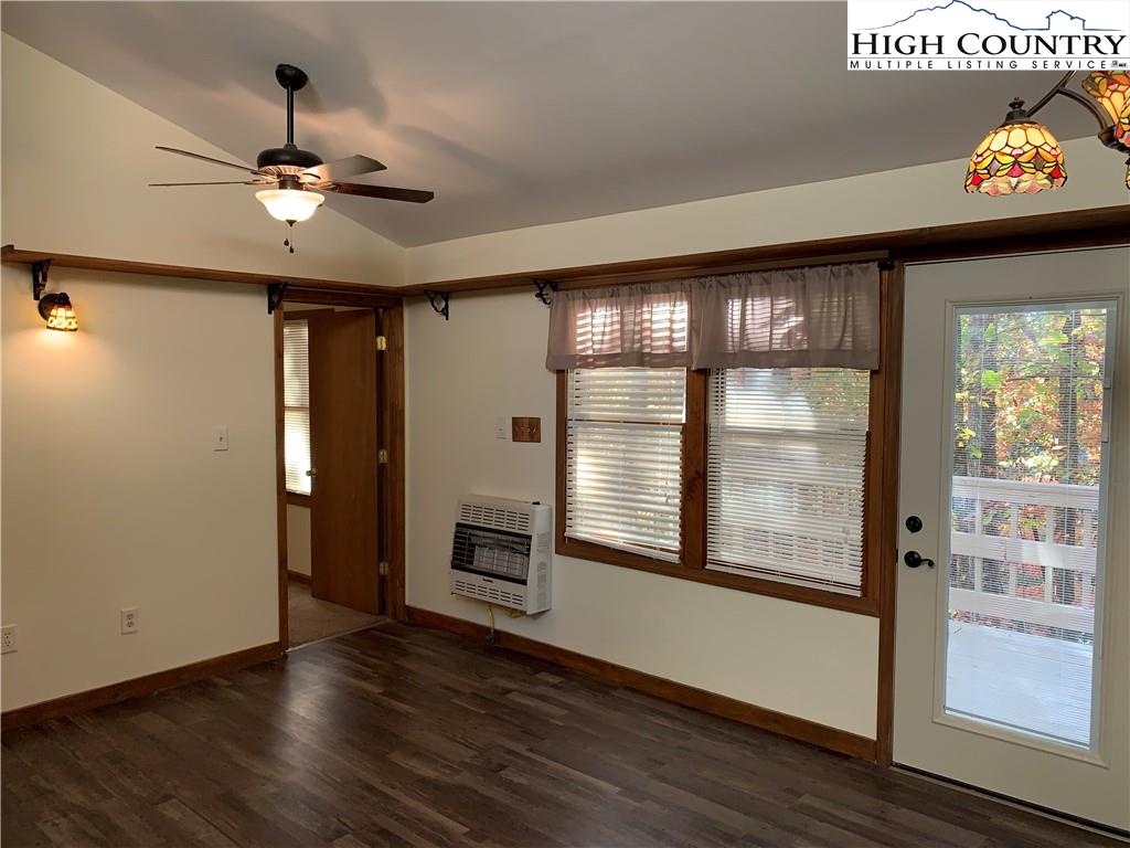 117 Horseshoe Ridge Road East Deep Gap, NC 28618 - Photo 20 of 50 a very nice looking room with a large window and wooden floor