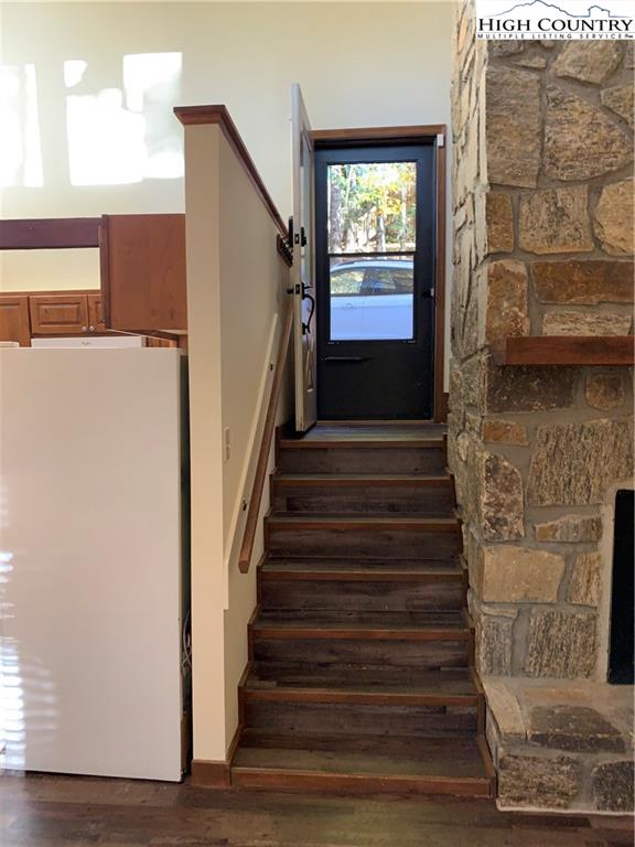 117 Horseshoe Ridge Road East Deep Gap, NC 28618 - Photo 21 of 50 a view of entryway and hall with wooden floor