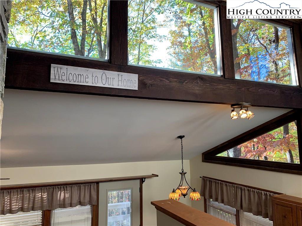 117 Horseshoe Ridge Road East Deep Gap, NC 28618 - Photo 24 of 50 a view of sitting area in front of a building
