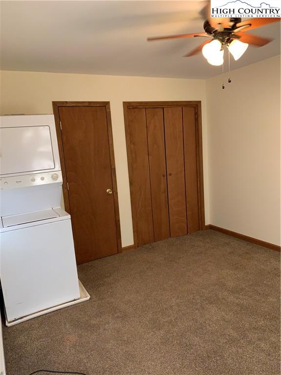 117 Horseshoe Ridge Road East Deep Gap, NC 28618 - Photo 32 of 50 a view of an empty room with a window
