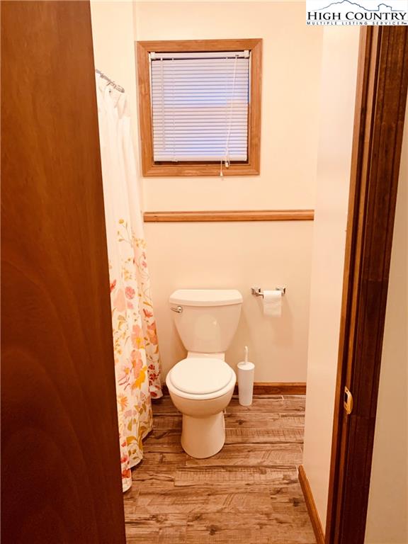 117 Horseshoe Ridge Road East Deep Gap, NC 28618 - Photo 34 of 50 a bathroom with a toilet and a sink