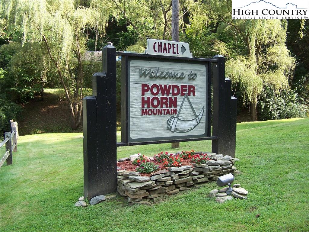 117 Horseshoe Ridge Road East Deep Gap, NC 28618 - Photo 43 of 50 a sign on the side of the road