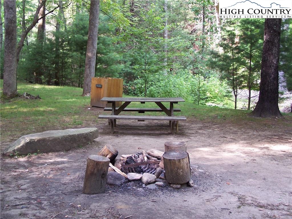117 Horseshoe Ridge Road East Deep Gap, NC 28618 - Photo 47 of 50 a view of a park with a bench