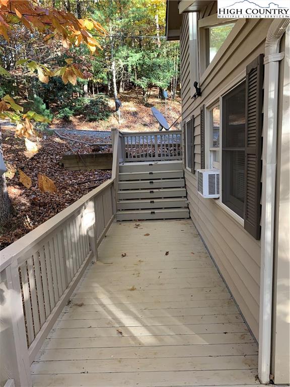 117 Horseshoe Ridge Road East Deep Gap, NC 28618 - Photo 6 of 50 a view of a pathway both side of building