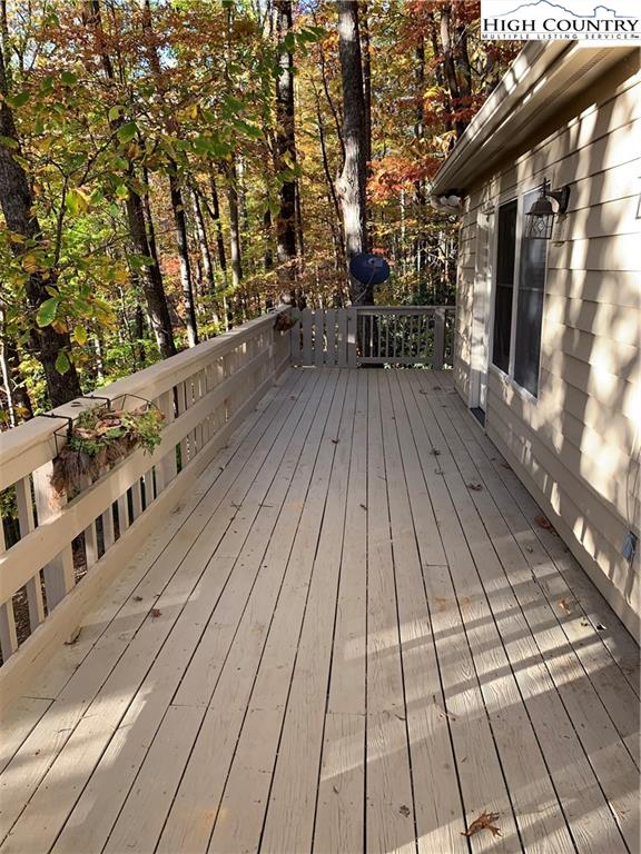 117 Horseshoe Ridge Road East Deep Gap, NC 28618 - Photo 7 of 50 a view of balcony with wooden floor and outdoor space