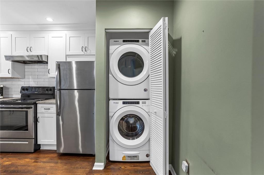 144 Woodmere Square Northwest Atlanta, GA 30327 - Photo 16 of 39 a utility room with sink dryer and washer