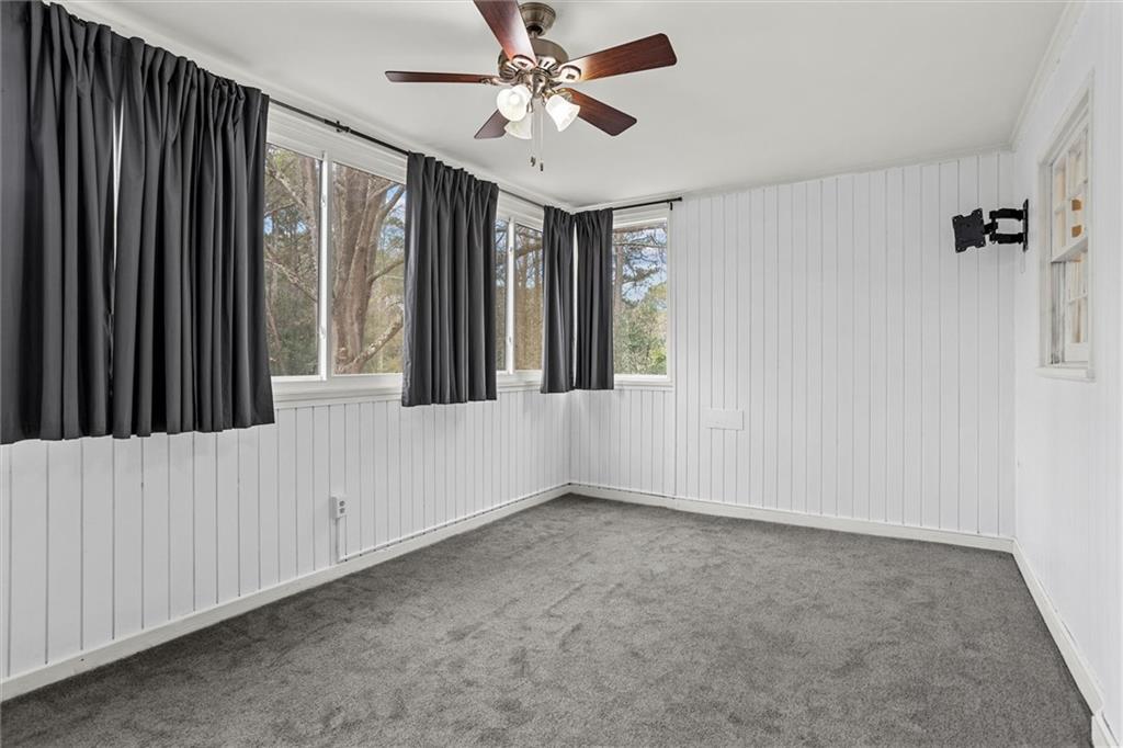 144 Woodmere Square Northwest Atlanta, GA 30327 - Photo 24 of 39 a view of an empty room with a window