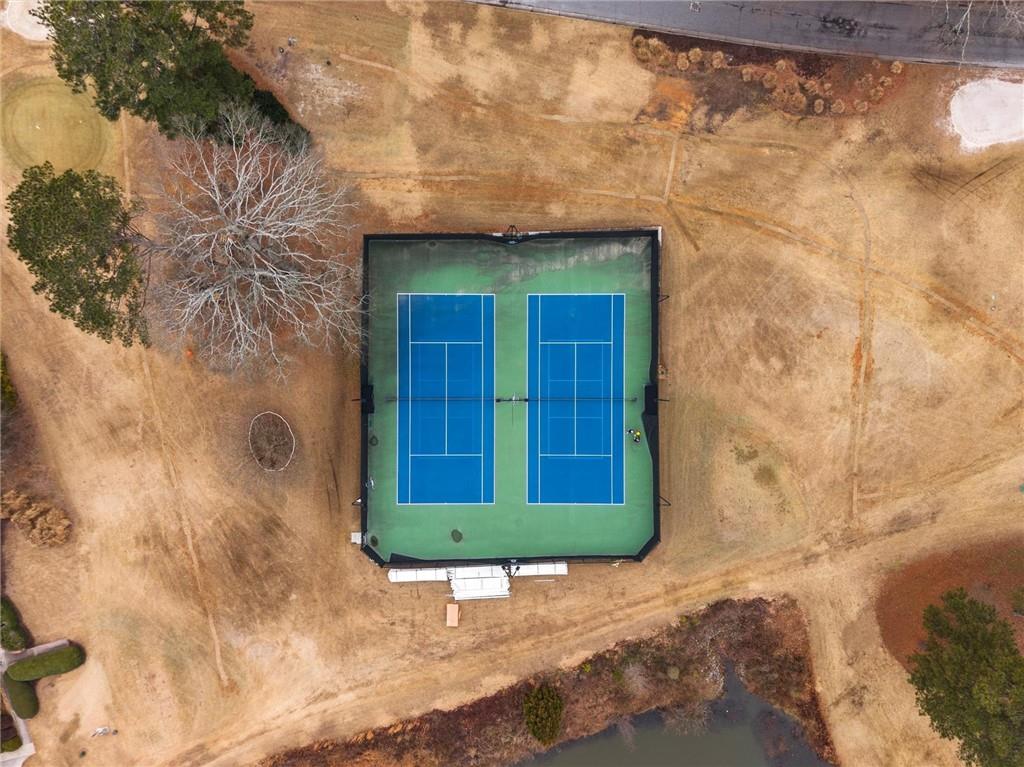 144 Woodmere Square Northwest Atlanta, GA 30327 - Photo 39 of 39 a view of a backyard of a house