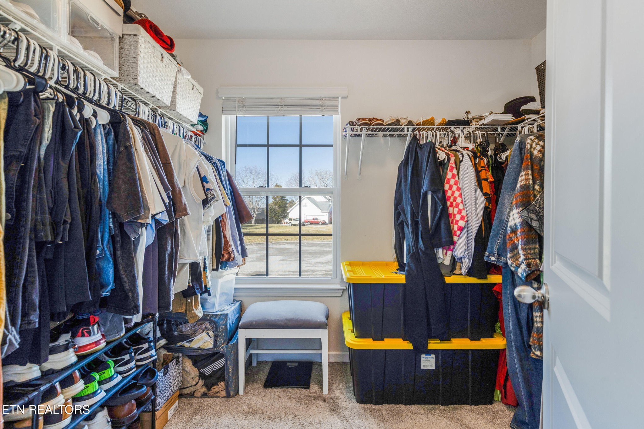 7200 Ponds Inlet Lane Powell, TN 37849 - Photo 20 of 38 a view of walk in closet with clothes and shoes