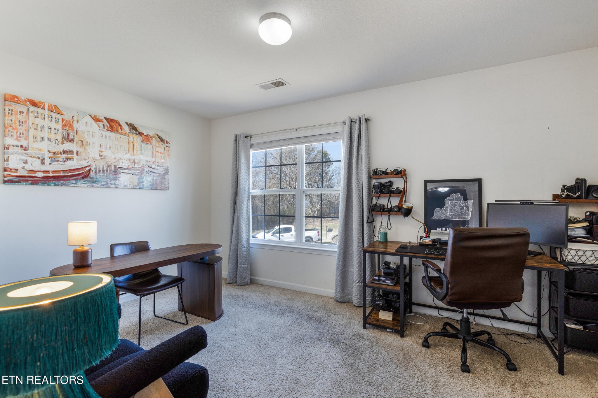 7200 Ponds Inlet Lane Powell, TN 37849 - Photo 22 of 38 a view of a workspace with furniture and a window