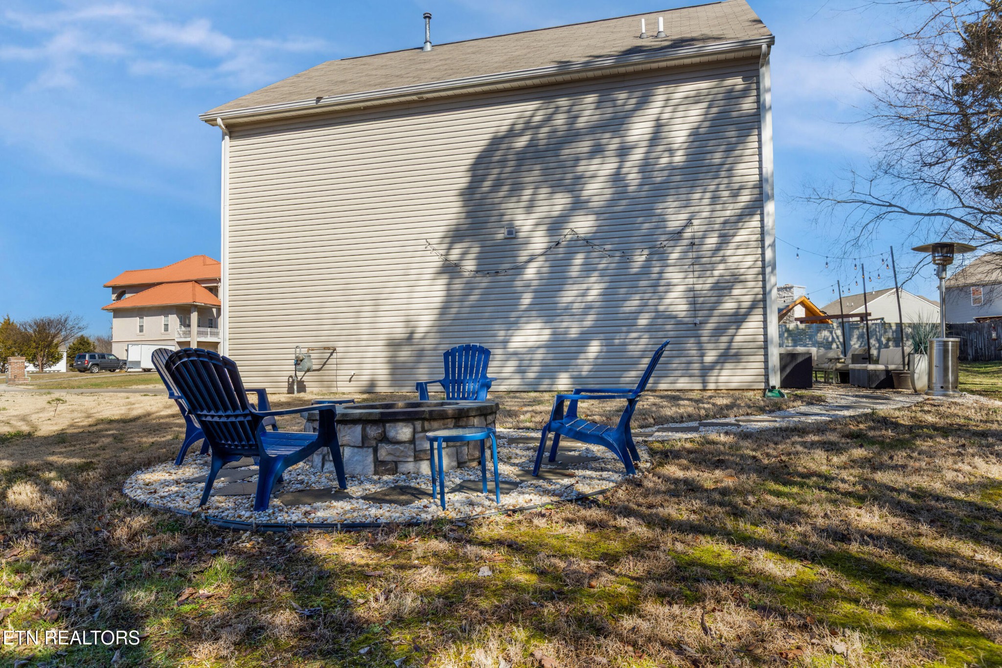 7200 Ponds Inlet Lane Powell, TN 37849 - Photo 30 of 38 a patio with table and chairs
