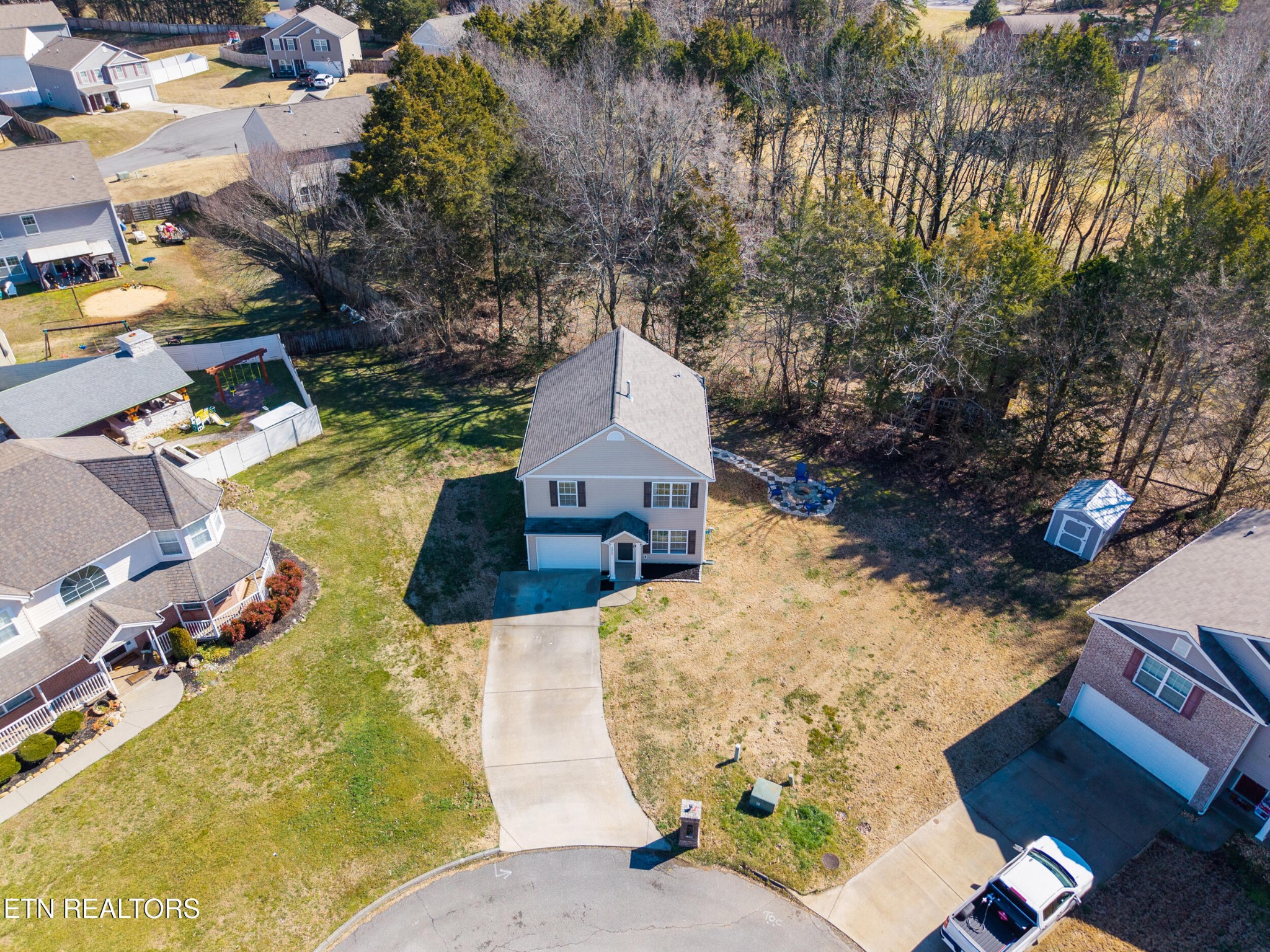 7200 Ponds Inlet Lane Powell, TN 37849 - Photo 32 of 38 an aerial view of a house with swimming pool