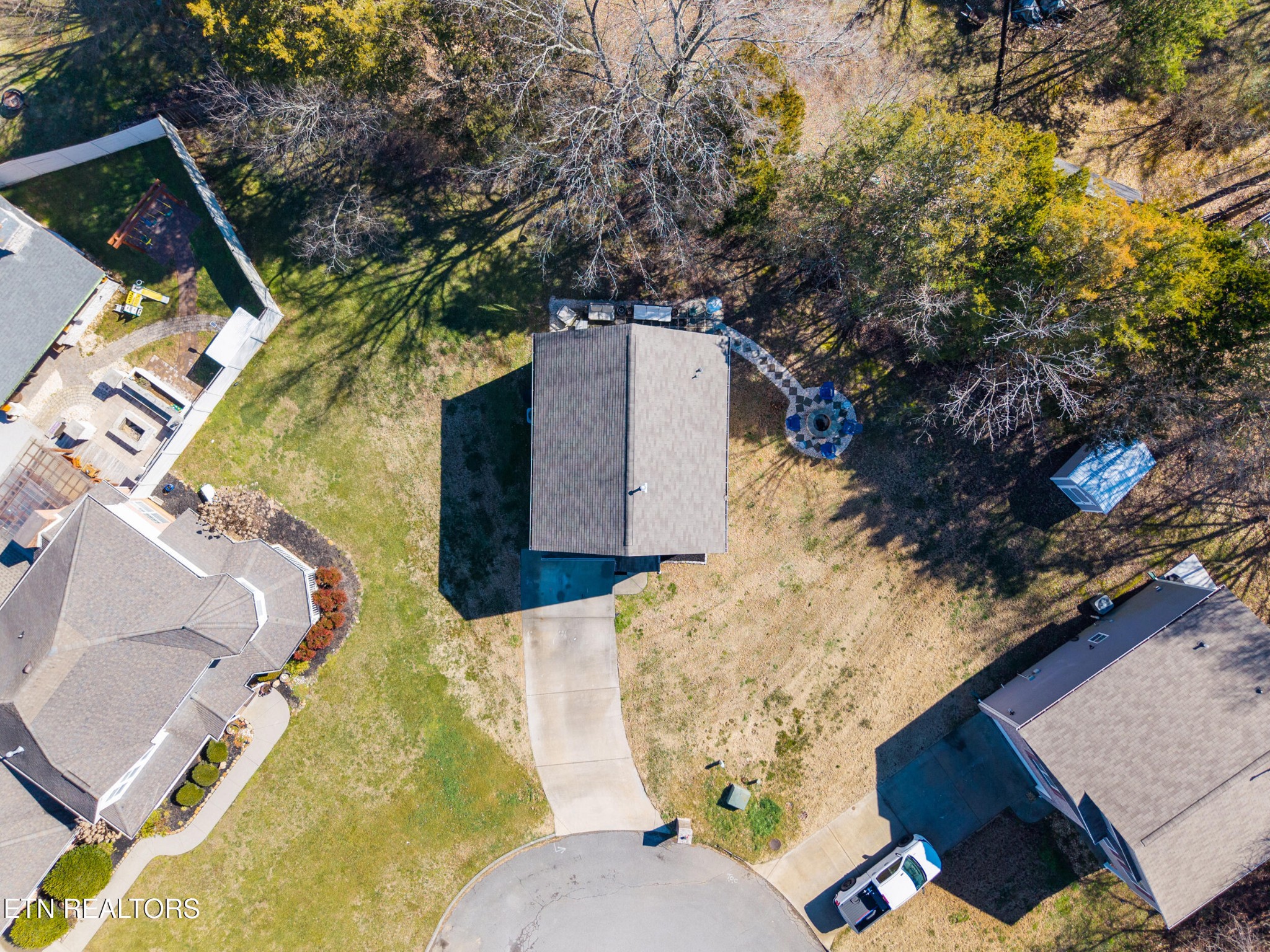 7200 Ponds Inlet Lane Powell, TN 37849 - Photo 35 of 38 view of backyard with wooden fence and large trees
