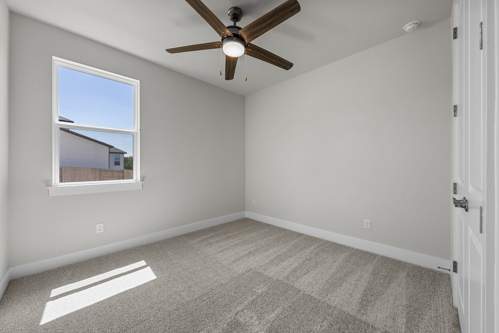 674 Iron Willow Loop Dripping Springs, TX 78620 - Photo 27 of 33 a view of room with window and ceiling fan
