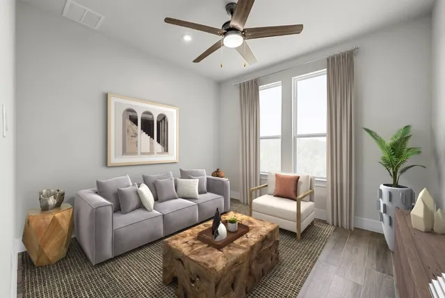 a living room with furniture and a window