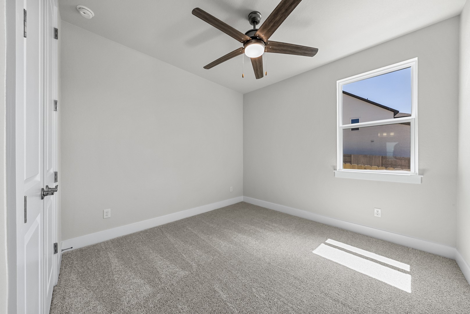 674 Iron Willow Loop Dripping Springs, TX 78620 - Photo 30 of 33 a view of room with window and ceiling fan