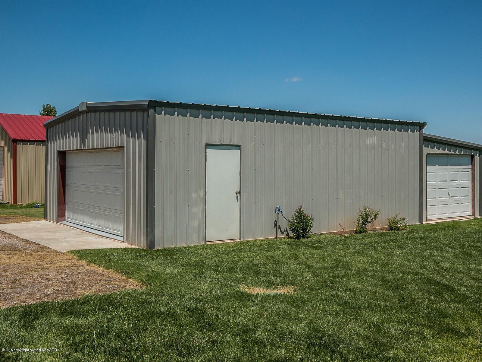 9151 Greyhawk Road Amarillo, TX 79119 - Photo 27 of 31 a view of an house with backyard