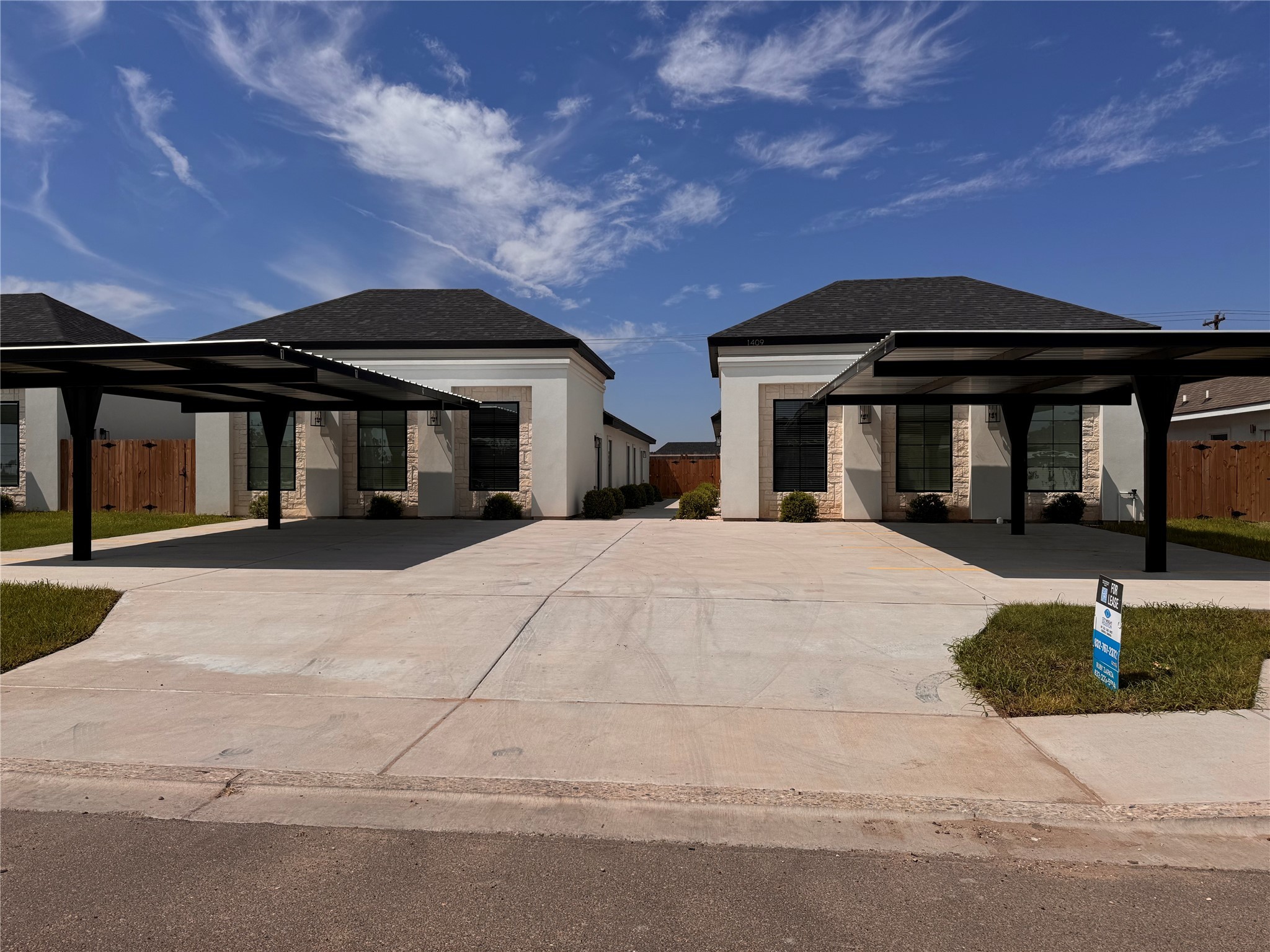 1409 South Xanthia Street Alton, TX 78573 - Photo 1 of 14 a front view of a house with a yard
