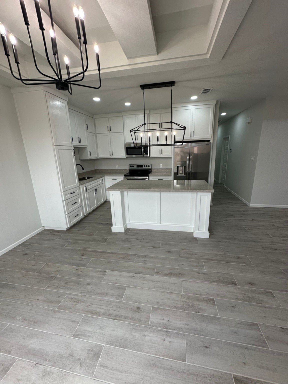 1409 South Xanthia Street Alton, TX 78573 - Photo 4 of 14 a view of a kitchen with a sink