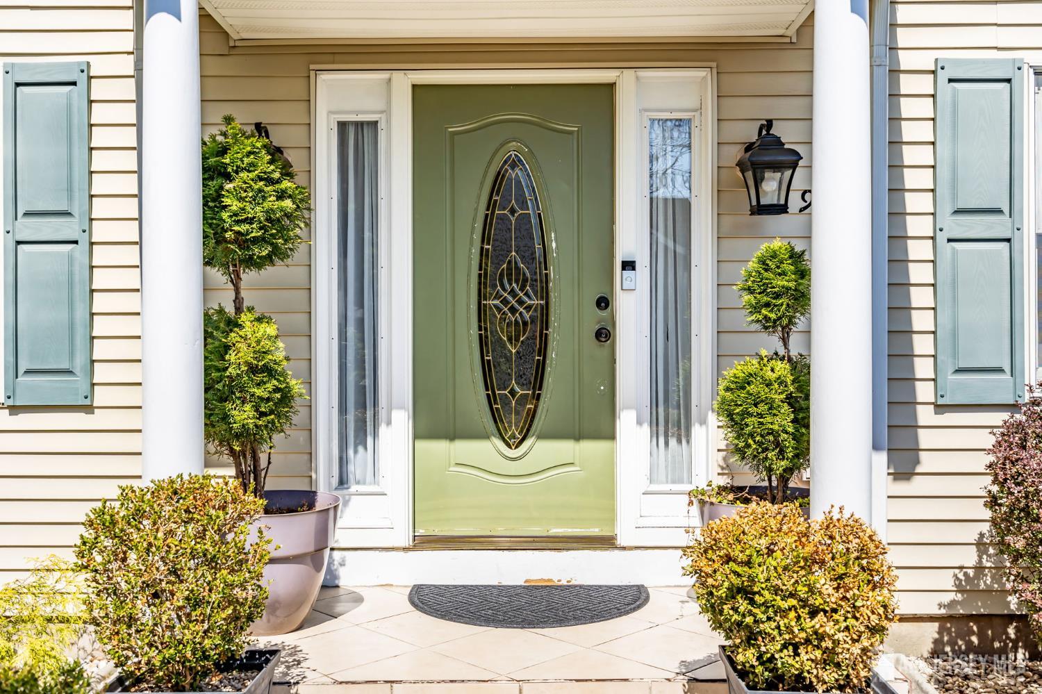 90 Bear Brook Road Princeton, NJ 08540 - Photo 12 of 60 a view of a front door of the house and outdoor space