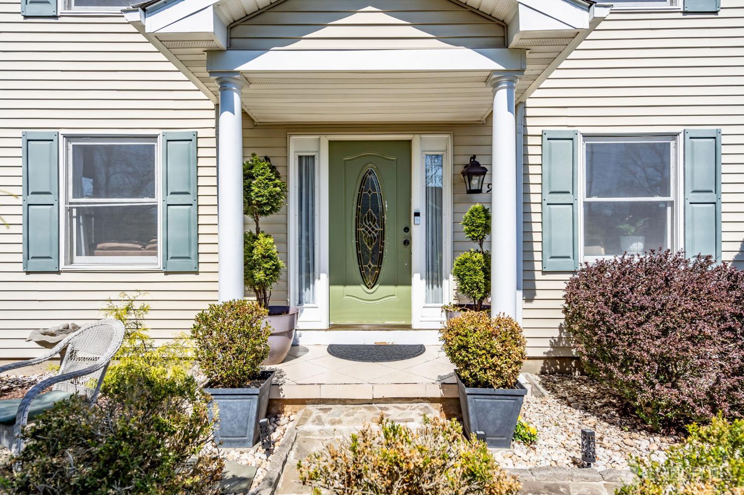 90 Bear Brook Road Princeton, NJ 08540 - Photo 13 of 60 a front view of a house with a yard