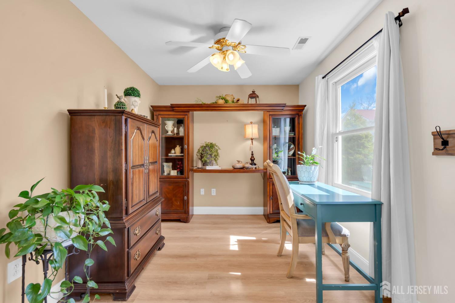90 Bear Brook Road Princeton, NJ 08540 - Photo 18 of 60 a view of living room kitchen with furniture and a potted plant