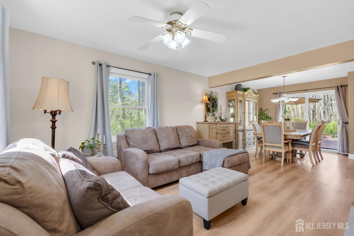 90 Bear Brook Road Princeton, NJ 08540 - Photo 19 of 60 a living room with furniture and a large window